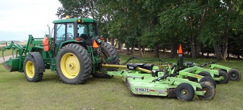 6410 John Deere Tractor and Schulte Brush Mower